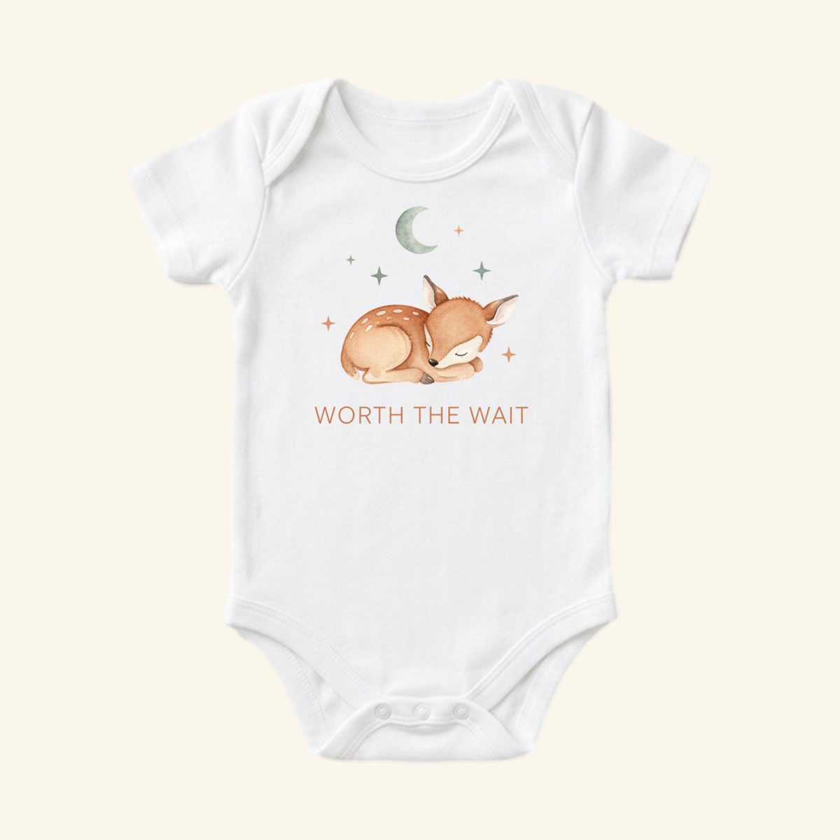 Worth the Wait Baby Onesie – Sleeping Deer Bodysuit featuring a white woodland design with a watercolor illustration of a sleeping fawn beneath a crescent moon and stars, with the text WORTH THE WAIT printed below.