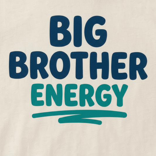 The Toodleroos Big Brother Energy Toddler Shirt – Confident Sibling Tee features the text BIG BROTHER ENERGY in bold blue and teal letters on a soft light fabric, with ENERGY underlined in teal—a perfect way to celebrate your little one’s new role as big brother.