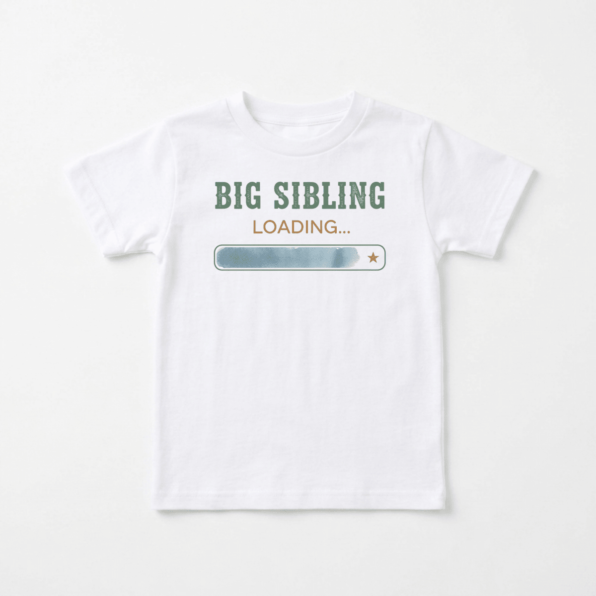 The Toodleroos Big Sibling Loading Toddler Shirt – Pregnancy Announcement features a white t-shirt with green “BIG SIBLING” text, orange “LOADING...” lettering, and a blue loading bar graphic with a star at the end, all centered on the chest—making it perfect for announcing a big sibling or as a fun toddler pregnancy reveal shirt.