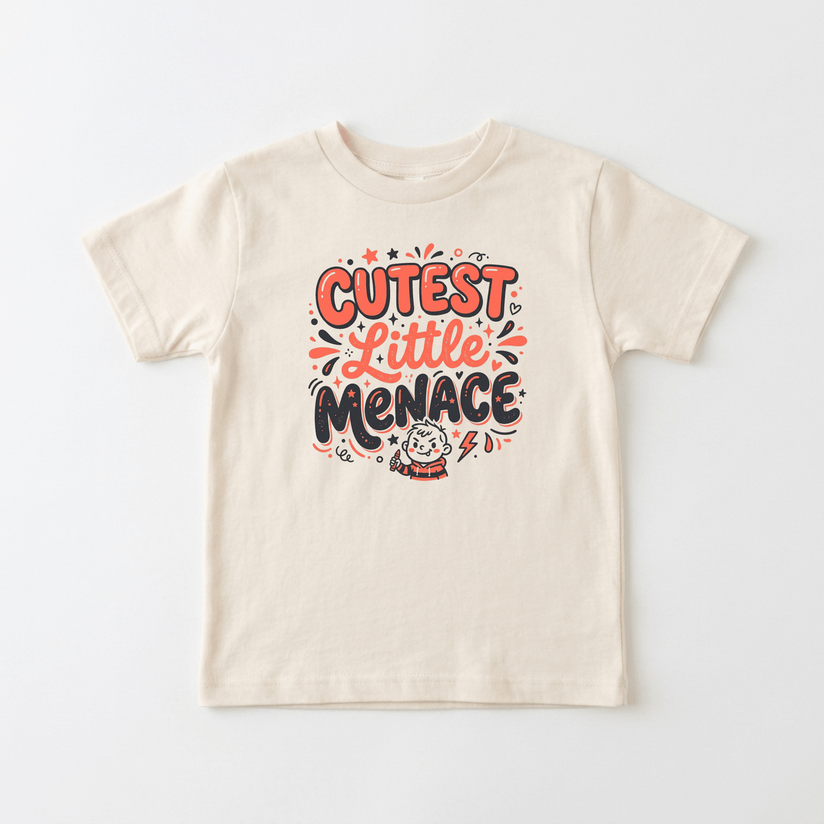 Dress your little one in the Cutest Little Menace Toddler Boys Shirt – Funny Sassy Tee by Toodleroos! This beige tee features playful red and black lettering that reads “Cutest Little Menace,” fun doodles, and a charming cartoon kitten in a red scarf at the bottom. Perfect for everyday adventures, this adorable Toodleroos toddler tee adds a dash of personality and sass to your child’s wardrobe.