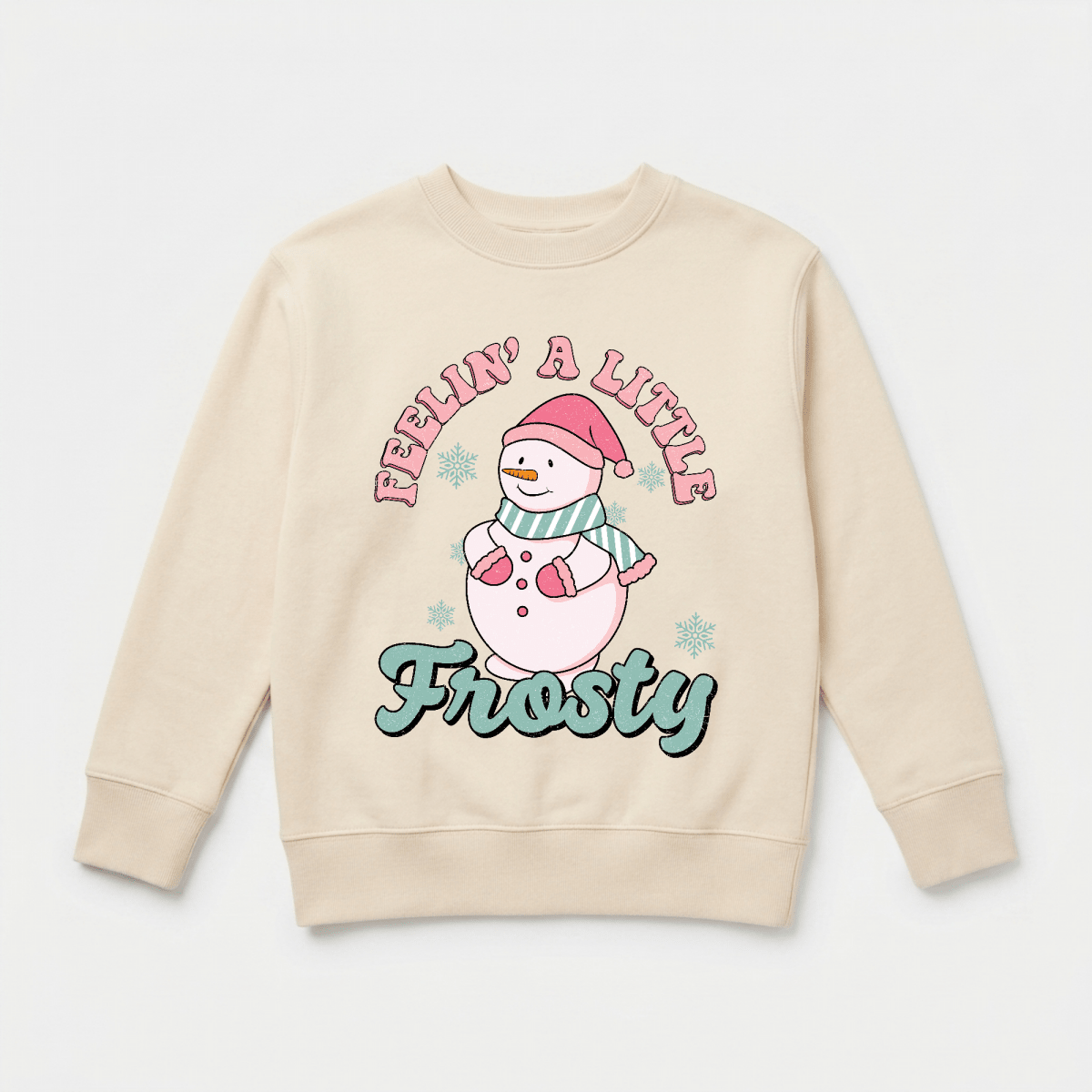 Dress your little one in festive cheer with the Feelin’ a Little Frosty Toddler Sweatshirt by Toodleroos! This beige girls’ winter shirt showcases a retro-inspired snowman sporting a pink hat and scarf, surrounded by playful snowflakes. “Feelin’ a little Frosty” is printed in whimsical pink and teal lettering above and below the cheerful snowman, capturing vintage holiday vibes perfect for cozy, stylish outfits all season long.