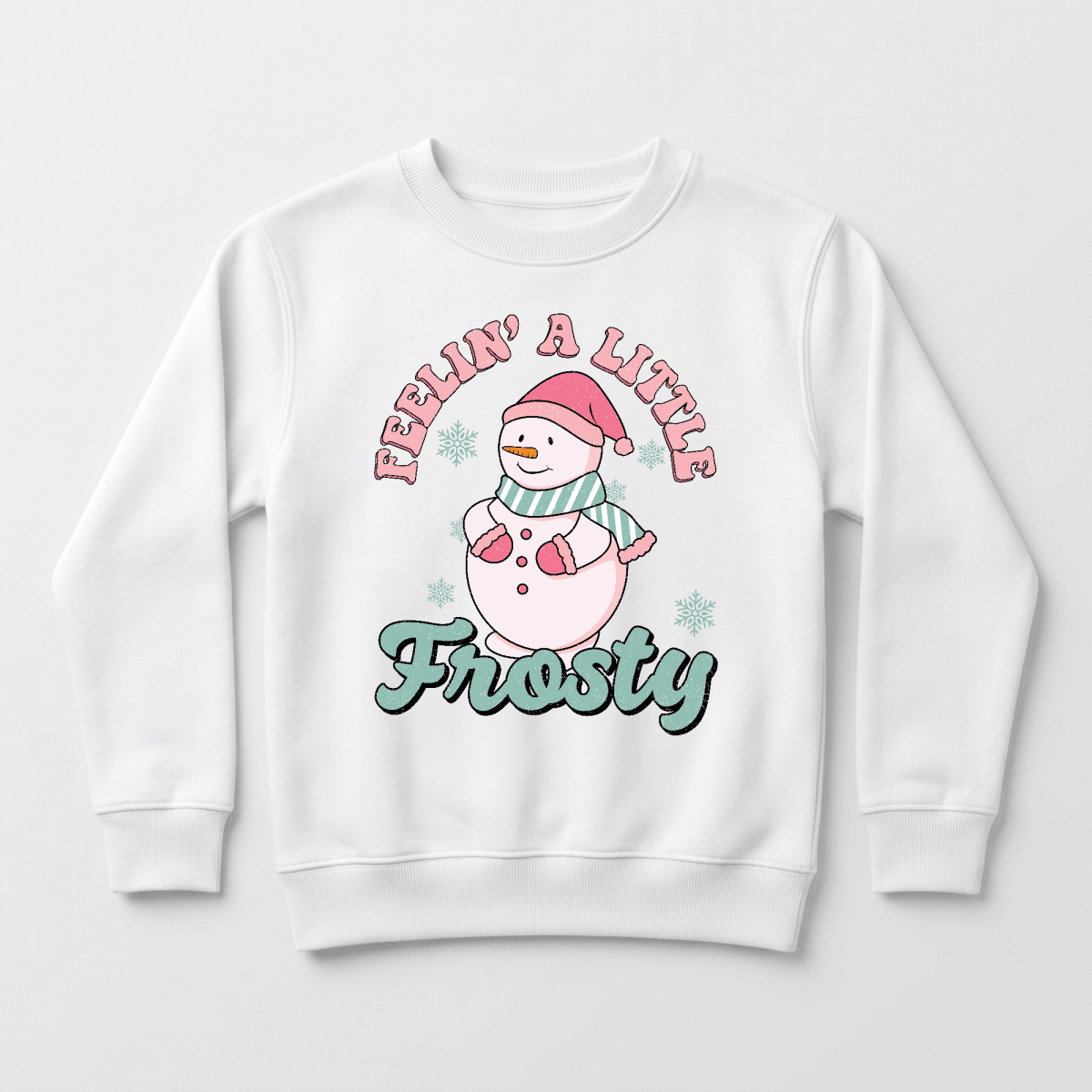 Dress your little one in cozy holiday style with the Toodleroos Feelin’ a Little Frosty Toddler Sweatshirt – Retro Snowman Sweatshirt. This white sweatshirt features a cheerful snowman sporting a pink hat and scarf, surrounded by pretty snowflakes and “Feelin’ a Little Frosty” in playful pink and green lettering. It’s the perfect girls’ winter top for festive fun all season long!.