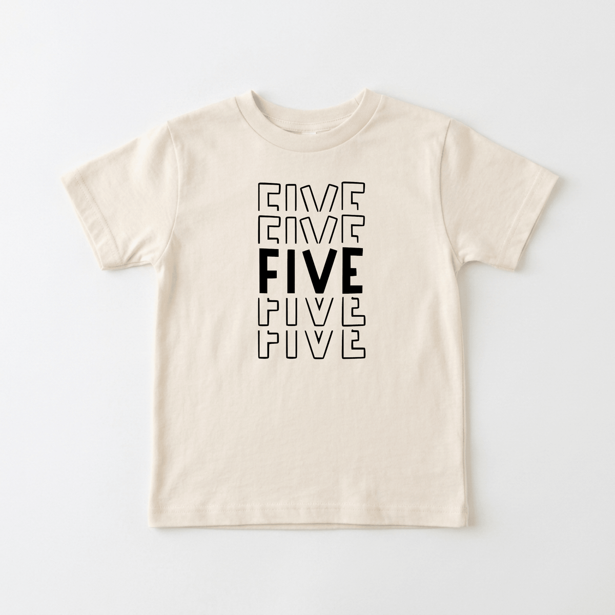 Introducing the Bold 5th Birthday Kids Shirt – 5th Birthday Tee by Toodleroos! This gender-neutral, cream-colored t-shirt features short sleeves and a unique design with the word “FIVE” stacked vertically five times. The center “FIVE” stands out in a bold black font, while the other four are displayed above and below in a thinner, outlined, stylized font. Perfect for any stylish fifth birthday celebration, this kids birthday shirt makes an ideal choice for a fun and memorable milestone.
