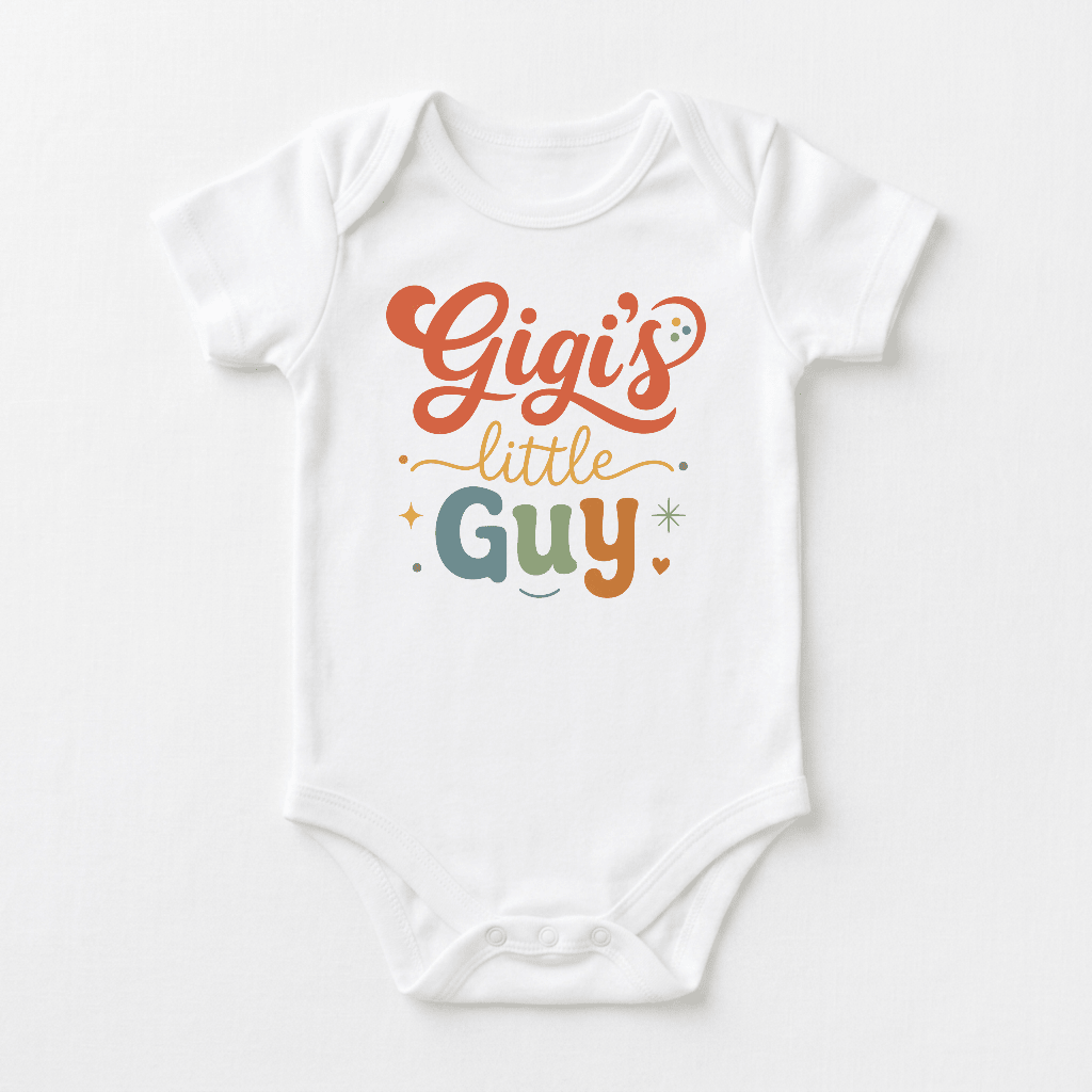 Dress your little one in the Toodleroos Gigi Baby Onesie – Gigi’s Little Guy Grandson Short-Sleeve Bodysuit. This white onesie features playful, colorful lettering that reads “Gigi’s Little Guy,” accented by charming stars and dots around the text. An adorable grandma gift, it’s perfect for celebrating your precious grandson.