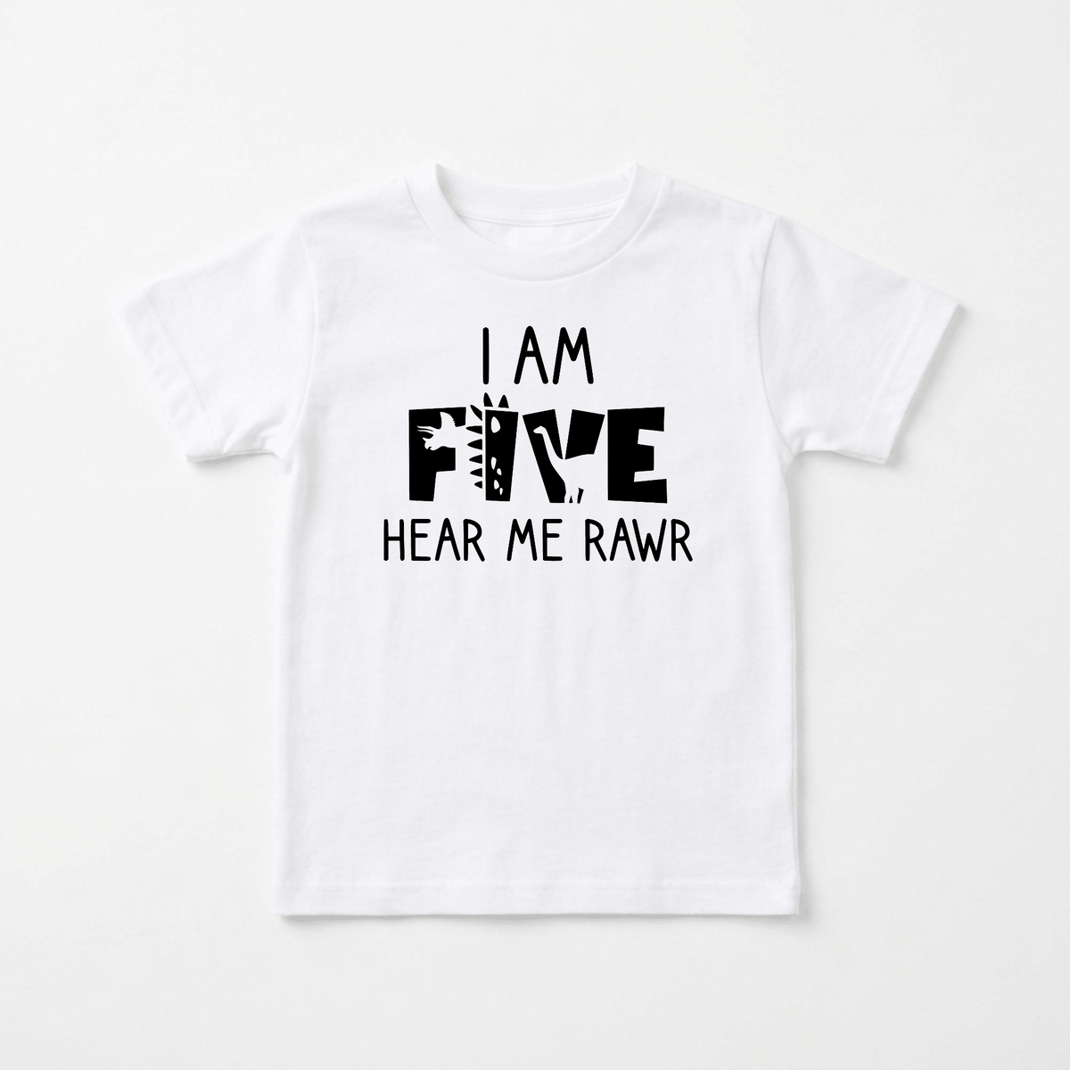 Dress your child in roar-some style with the Toodleroos I Am Five Hear Me Rawr Kids Shirt – Dinosaur 5th Birthday Tee! This white t-shirt showcases bold black text reading “I AM FIVE, HEAR ME RAWR,” with the word “FIVE” decorated in playful animal print patterns. Perfect as a dinosaur birthday shirt or kids dinosaur shirt, it makes an ideal choice for your little one’s 5th birthday celebration.