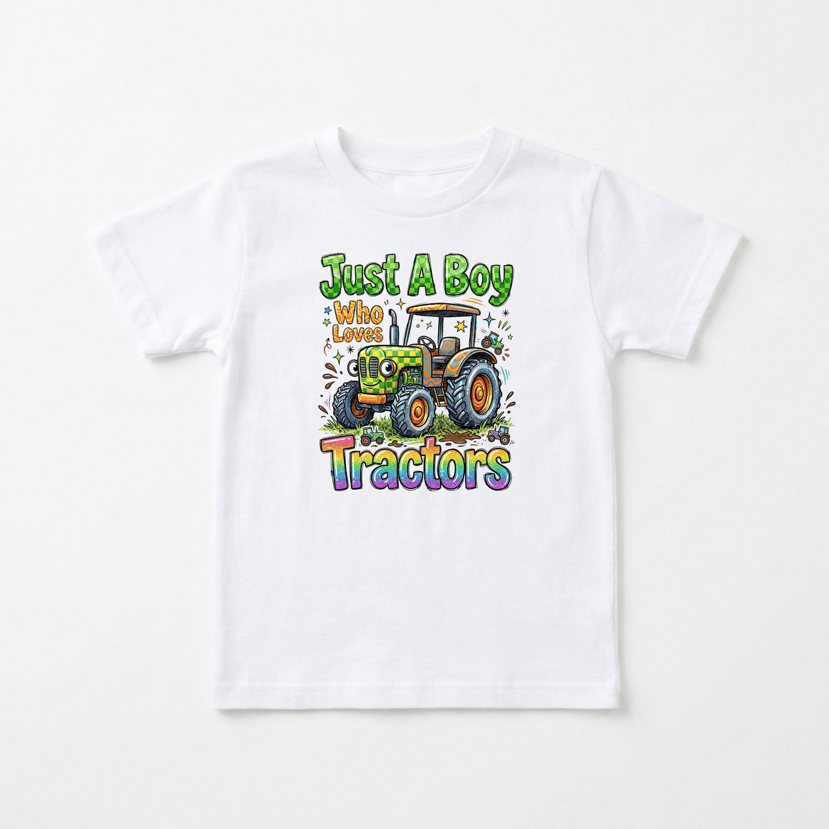 The Toodleroos “Just a Boy Who Loves Tractors Toddler Shirt – Farm Tractor Tee” is a white tee featuring colorful text and a cartoon tractor with fun decorative elements—perfect for little tractor enthusiasts and farm-loving boys.
