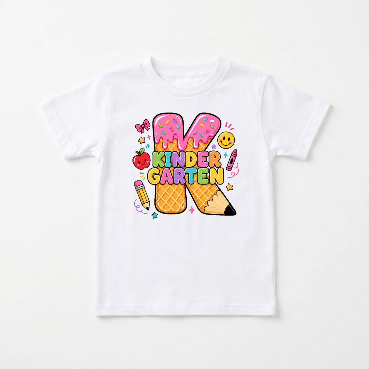 Introducing the Kindergarten Youth Girls Shirt – Ice Cream K Tee by Toodleroos. This playful, child-friendly t-shirt features vibrant “Kindergarten” text, a large letter K designed to look like a decorated ice cream with sprinkles, and charming illustrations including a cartoon pencil, crayons, smiley face, heart, butterfly, and stars. Perfect for the first day of school or as a fun back-to-school gift!.