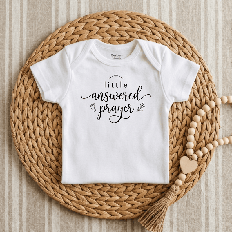 Baby wearing a cute graphic onesie outdoors