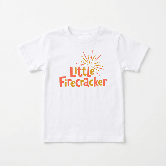 The Toodleroos Little Firecracker 4th of July Toddler Shirt features “Little Firecracker” written in orange and yellow letters, with a yellow firework graphic above the text. Displayed on a plain white background, this patriotic firework tee is perfect for toddlers.