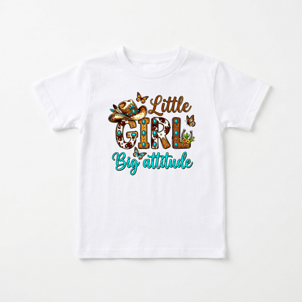 Dress your little one in the Toodleroos Little Girl Big Attitude Kids Shirt – a white western cowgirl tee featuring vibrant text that reads “Little Girl Big Attitude.” The word GIRL stands out with playful patterns, a cowboy hat, flowers, and butterflies—making it the perfect choice for your toddler’s western-inspired style.