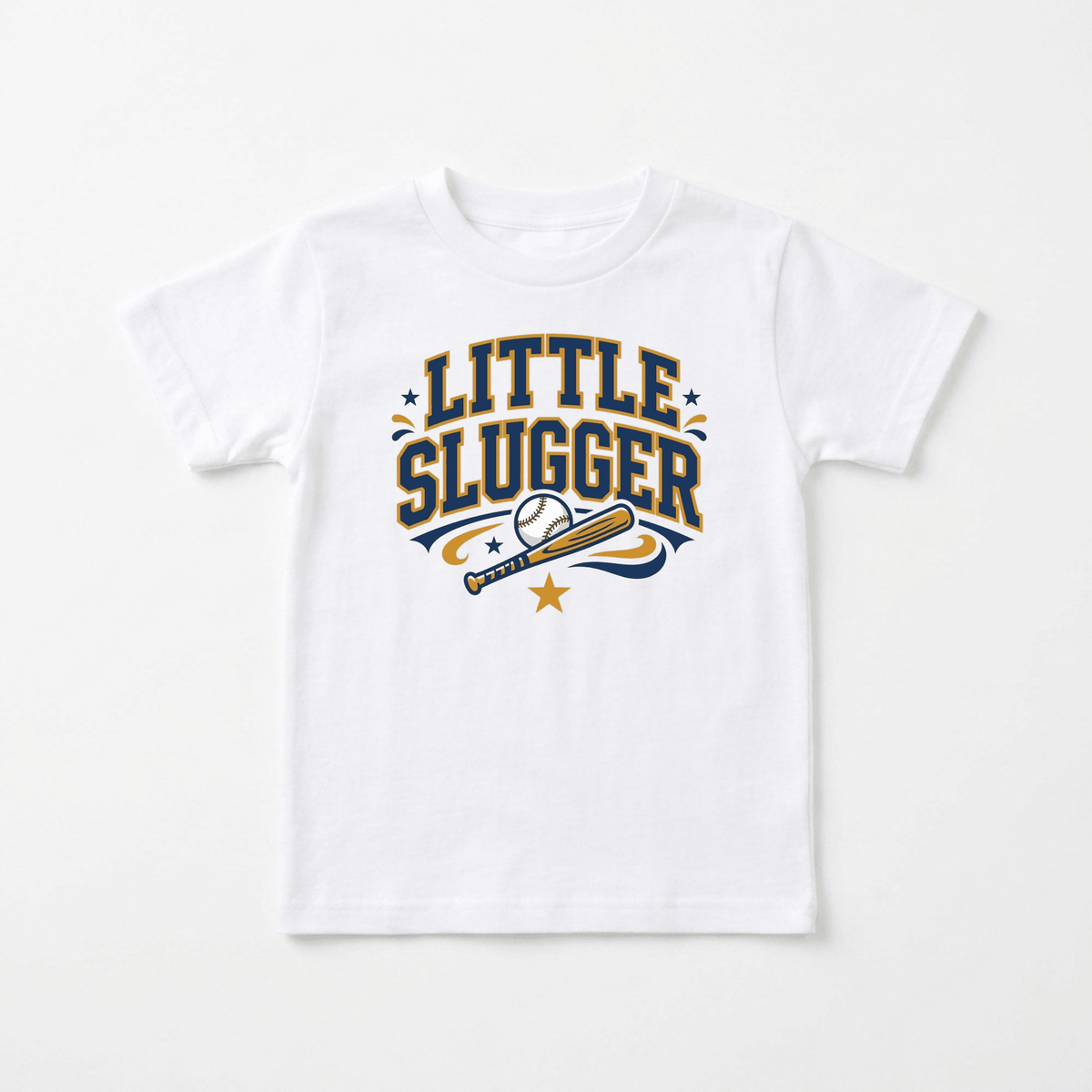 The Toodleroos Little Slugger Toddler Boys Baseball Shirt – Varsity Tee features bold yellow and navy “Little Slugger” lettering above a baseball and bat graphic with small surrounding stars, making this sporty white tee perfect for boys who love the game.