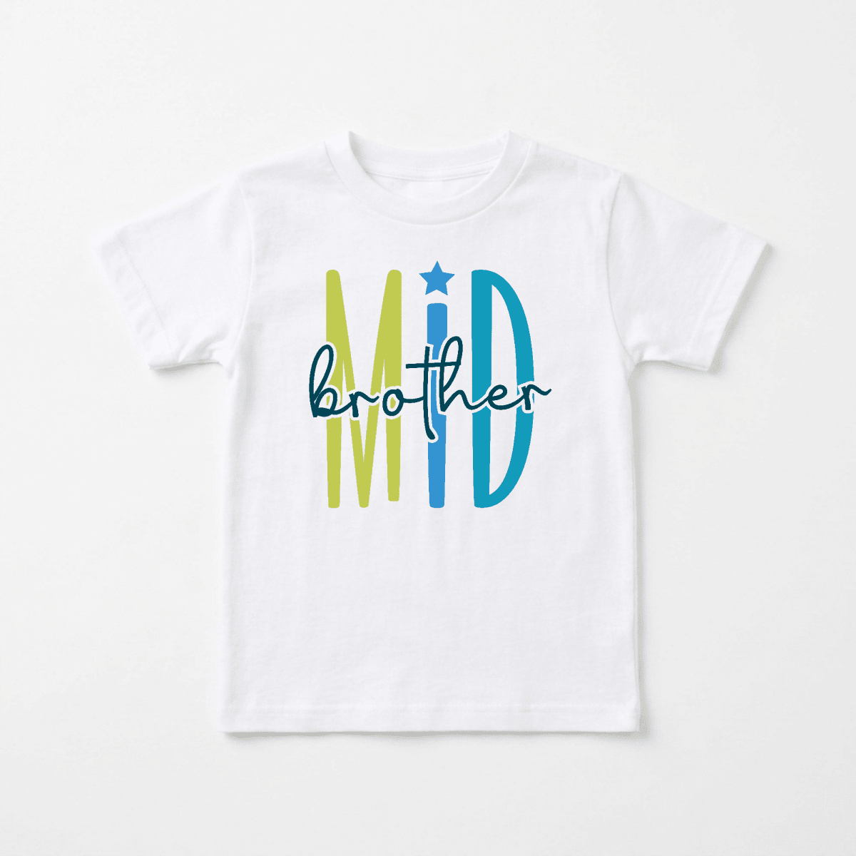 The Toodleroos Middle Brother Toddler Shirt – Colorful Sibling Design features a bold “MID brother” print, with a large green “M,” blue “ID,” and the word “brother” in playful blue script across the letters. This fun shirt is perfect for sibling announcements or family photos.