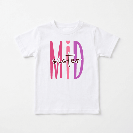 Introducing the Toodleroos Middle Sister Toddler Shirt – Bold Sibling Tee featuring “MID” in eye-catching pink and purple letters, with a delicate heart accent above the I. The word “sister” appears in a charming script across the middle, making this tee an adorable and stylish addition to any sibling shirt collection for your little one.