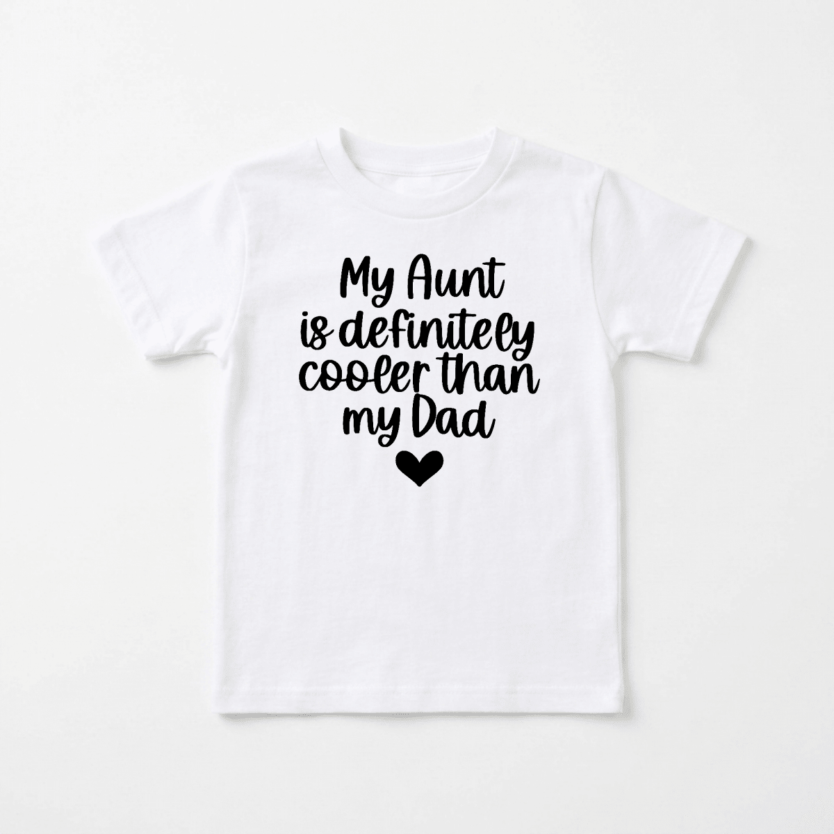 Introducing the My Aunt Is Definitely Cooler Than My Dad Toddler Shirt by Toodleroos—a white t-shirt with bold black text reading “My Aunt is definitely cooler than my Dad” and a cute black heart underneath. This funny family tee makes the perfect gift for a cool aunt or an adorable way for your little one to show off their favorite family member!.