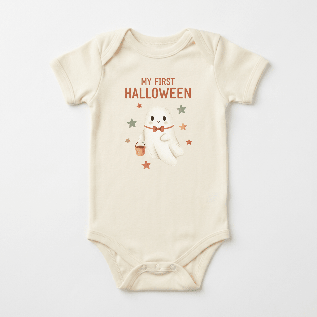 Dress your little one in the Toodleroos Baby’s First Halloween Onesie – Cute Ghost Short-Sleeve Bodysuit! This cream-colored baby bodysuit features an adorable smiling ghost holding a candy bucket, surrounded by orange and brown stars. The text “MY FIRST HALLOWEEN” appears above the cute design in festive orange letters—making it the perfect first Halloween outfit for your baby.