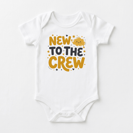 Dress your little one in the Toodleroos New to the Crew Baby Onesie – Announcement Bodysuit, featuring yellow and black text that reads “New to the Crew,” accented with scattered stars and a cheerful smiling cloud illustration above “the.” Perfect as a baby shower gift or for announcing your new arrival, this adorable bodysuit makes an ideal first hospital outfit.