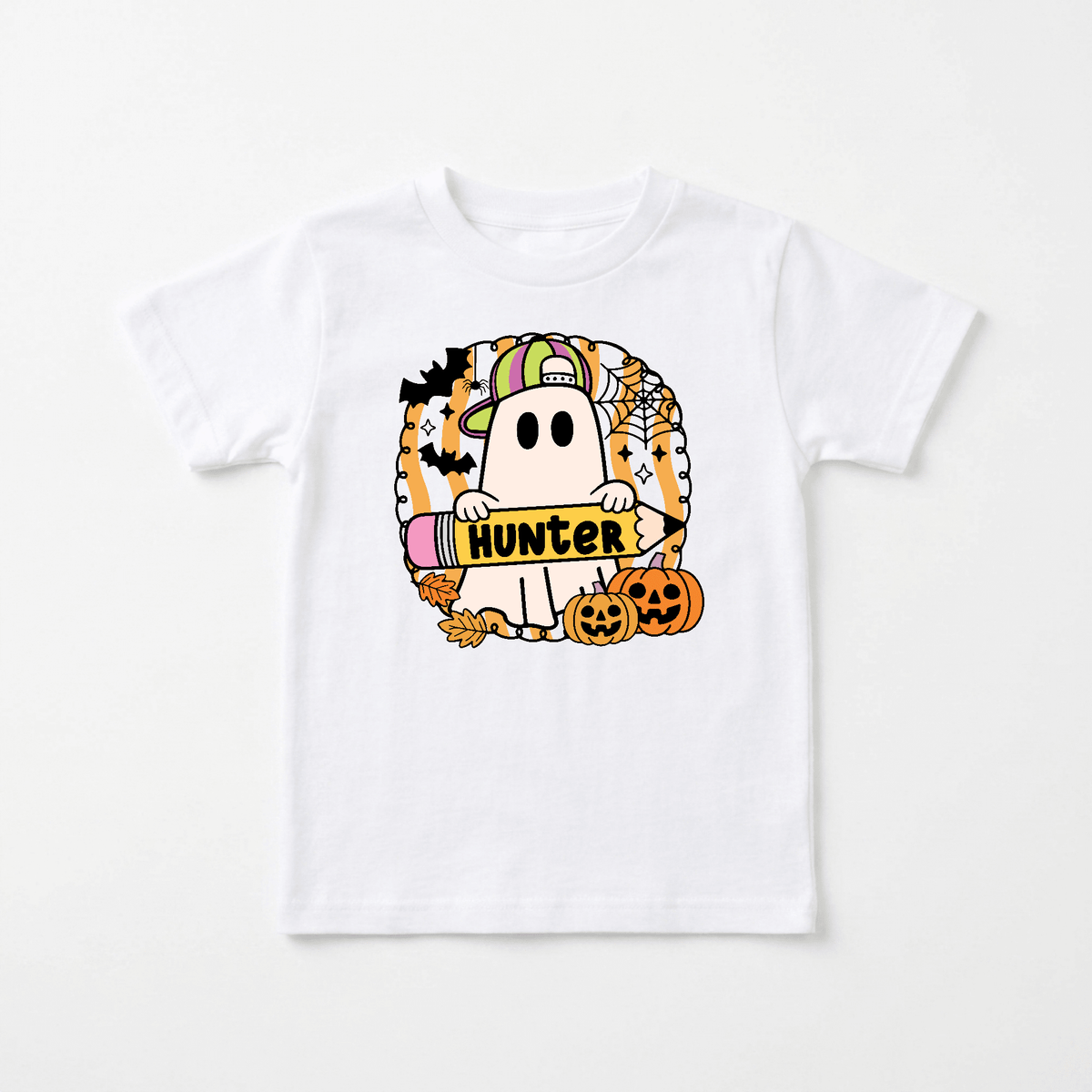 Dress your little one in spooky style with the Toodleroos Personalized Halloween Ghost Kids Shirt – Custom Name Tee! This adorable white shirt features a cute ghost holding a Hunter sign, surrounded by pumpkins, bats, a candy corn hat, spider webs, and stars in festive orange, black, and yellow Halloween-themed colors. The perfect personalized Halloween ghost shirt for your child!.