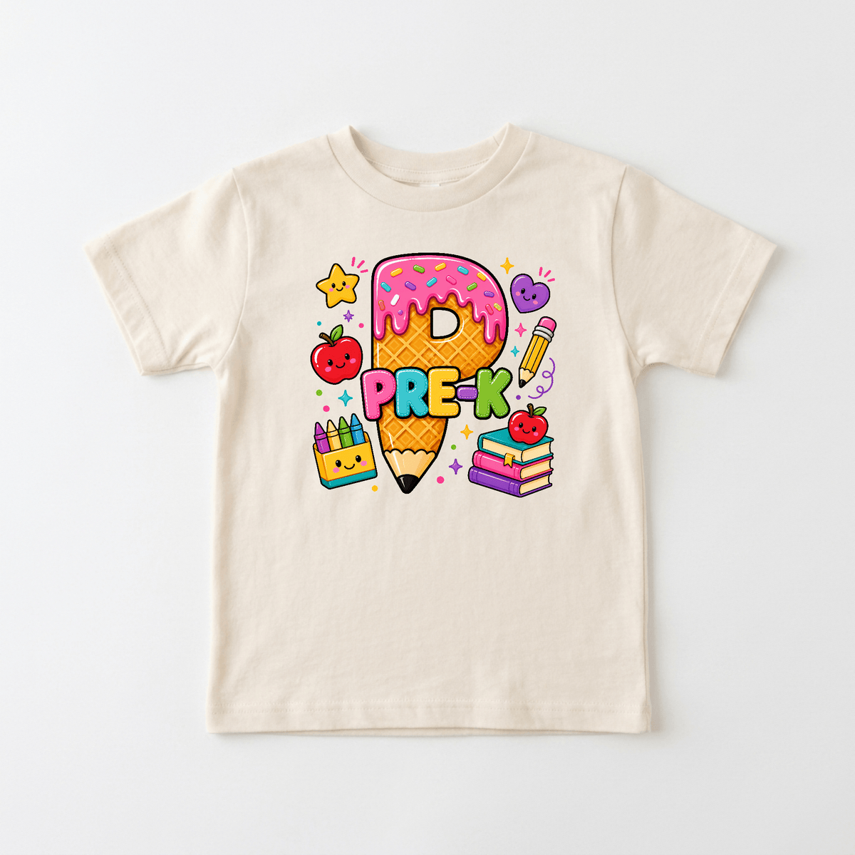 The Toodleroos Pre-K Kids Shirt – Back to School Tee is a beige t-shirt featuring a vibrant PRE-K design with playful details like a pencil shaped as the letter P, books, an apple, a crayon box, a heart, and stars—making it the perfect choice for Pre-K students or as an adorable back-to-school shirt.