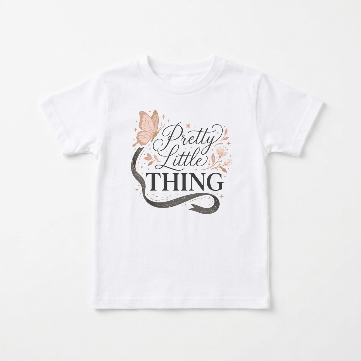 The Toodleroos Pretty Little Thing Toddler Tee – Cute Butterfly Girls Shirt features a charming butterfly and floral graphic with the words “Pretty Little Thing” in elegant script, surrounded by pink stars and swirls—perfect for little girls.