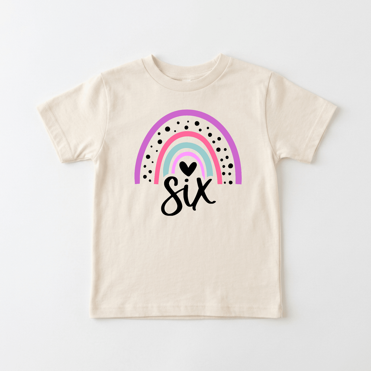 Celebrate your child’s special day with the Rainbow 6th Birthday Kids Shirt – 6th Birthday Tee by Toodleroos. This cream-colored t-shirt features a pastel rainbow accented with black dots above the word “six” in elegant black cursive, along with a small black heart inside the rainbow—making it an ideal kids birthday shirt or Rainbow 6th birthday shirt.