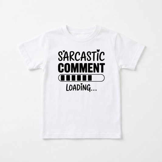 Add a touch of humor to your child’s wardrobe with the Toodleroos Sarcastic Comment Loading Toddler Shirt – Funny Loading Bar Tee, featuring the phrase “Sarcastic Comment Loading…” and a playful loading bar graphic below, perfect for showcasing your little one’s fun personality.