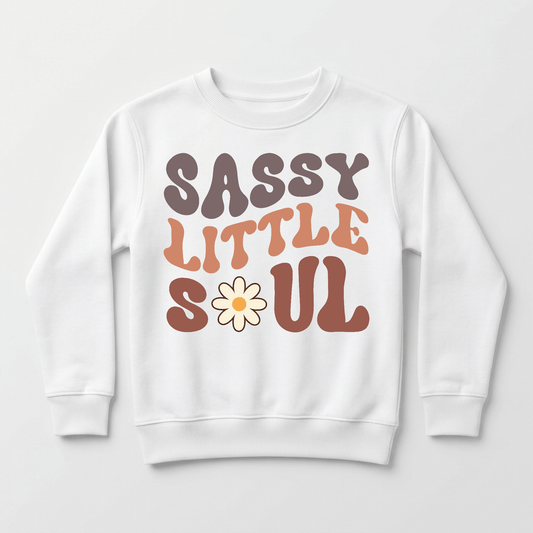 Crafted by Toodleroos, the Sassy Little Soul Kids Sweatshirt – Boho Retro Pullover is a cozy white fleece featuring a playful retro design: the phrase “Sassy Little Soul” appears in brown and orange, with a charming daisy replacing the “O” for a sweet boho flair.
