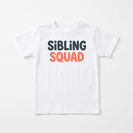 A white Sibling Squad Toddler Shirt from Toodleroos, featuring “SIBLING SQUAD” printed on the front—SIBLING in black and SQUAD in orange. This matching sibling tee is displayed flat on a plain background, ideal for coordinating outfits.