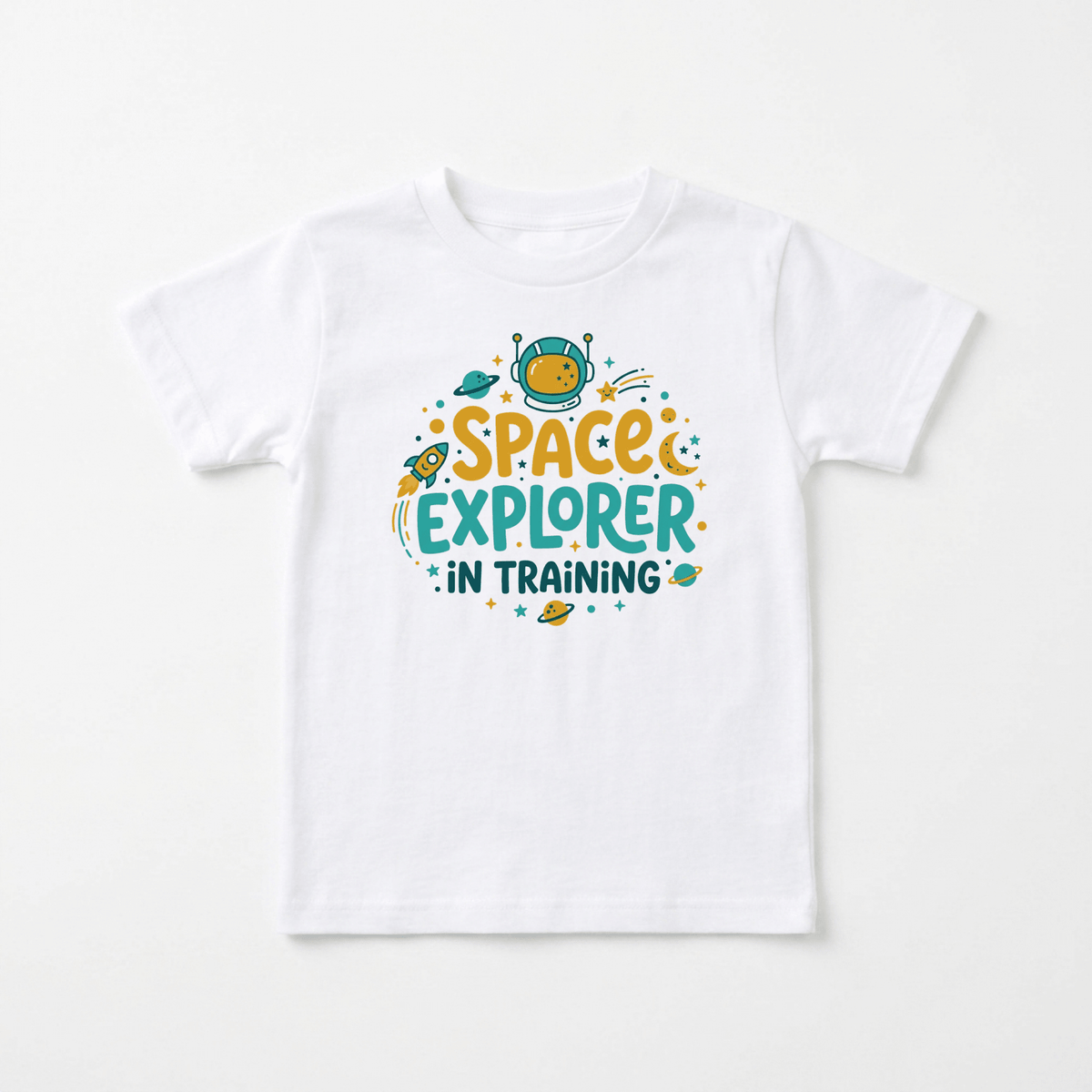 Dress your little one in out-of-this-world style with the Space Explorer in Training Toddler Shirt – Astronaut Tee from Toodleroos! This white tee features a playful cartoon space theme, with vibrant illustrations of stars, planets, a rocket, and an astronaut helmet surrounding the phrase “Space Explorer In Training.” Perfect for inspiring future astronauts and encouraging big dreams, this fun toddler shirt is an ideal choice for any young explorer.