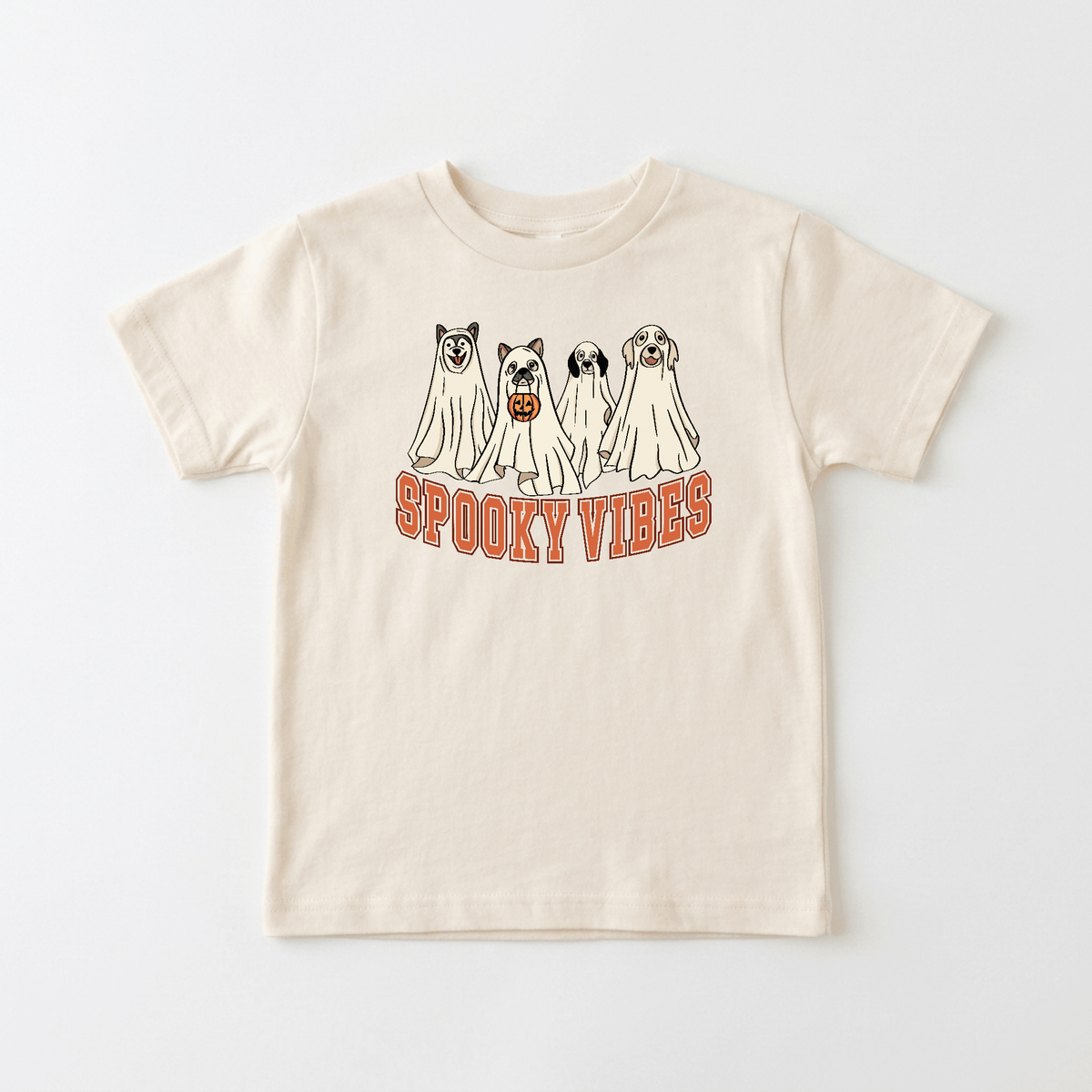 The Toodleroos Spooky Vibes Dog Ghosts Kids Shirt is a beige Halloween tee featuring cartoon dogs dressed as ghosts and bold orange “SPOOKY VIBES” text—an adorable and playful choice for kids.