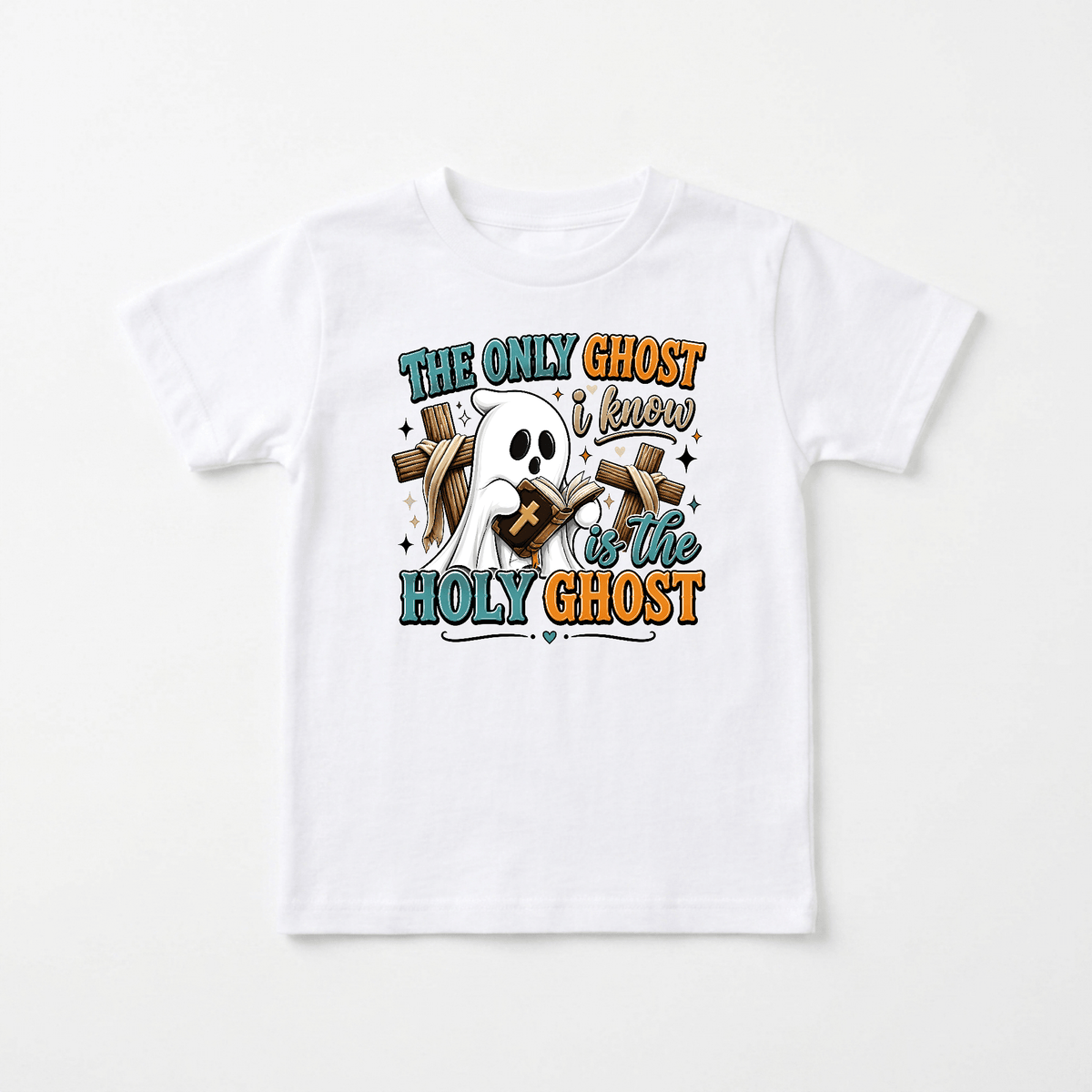 The Only Ghost I Know Kids Shirt – Holy Ghost Halloween Tee by Toodleroos features a white t-shirt adorned with a cartoon ghost holding a cross and Bible. The playful, faith-inspired design includes the phrase “The only ghost I know is the Holy Ghost,” surrounded by stars, sparkles, and wooden crosses—making it the perfect Halloween shirt for Christian kids.