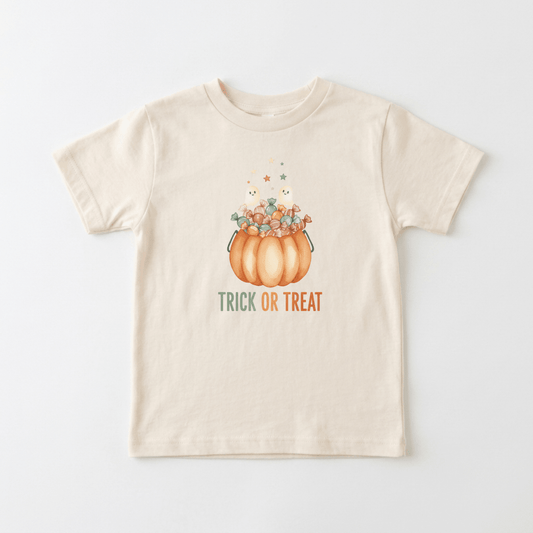 Dress your little one in Halloween style with the Toodleroos Toddler Halloween Shirt – Trick or Treat Pumpkin & Ghost Tee! This beige t-shirt features a playful pumpkin candy bucket, cheerful stars, and a friendly ghost, with “Trick or Treat” printed below in orange and green. It’s the perfect festive shirt for trick-or-treating or any Halloween celebration!.