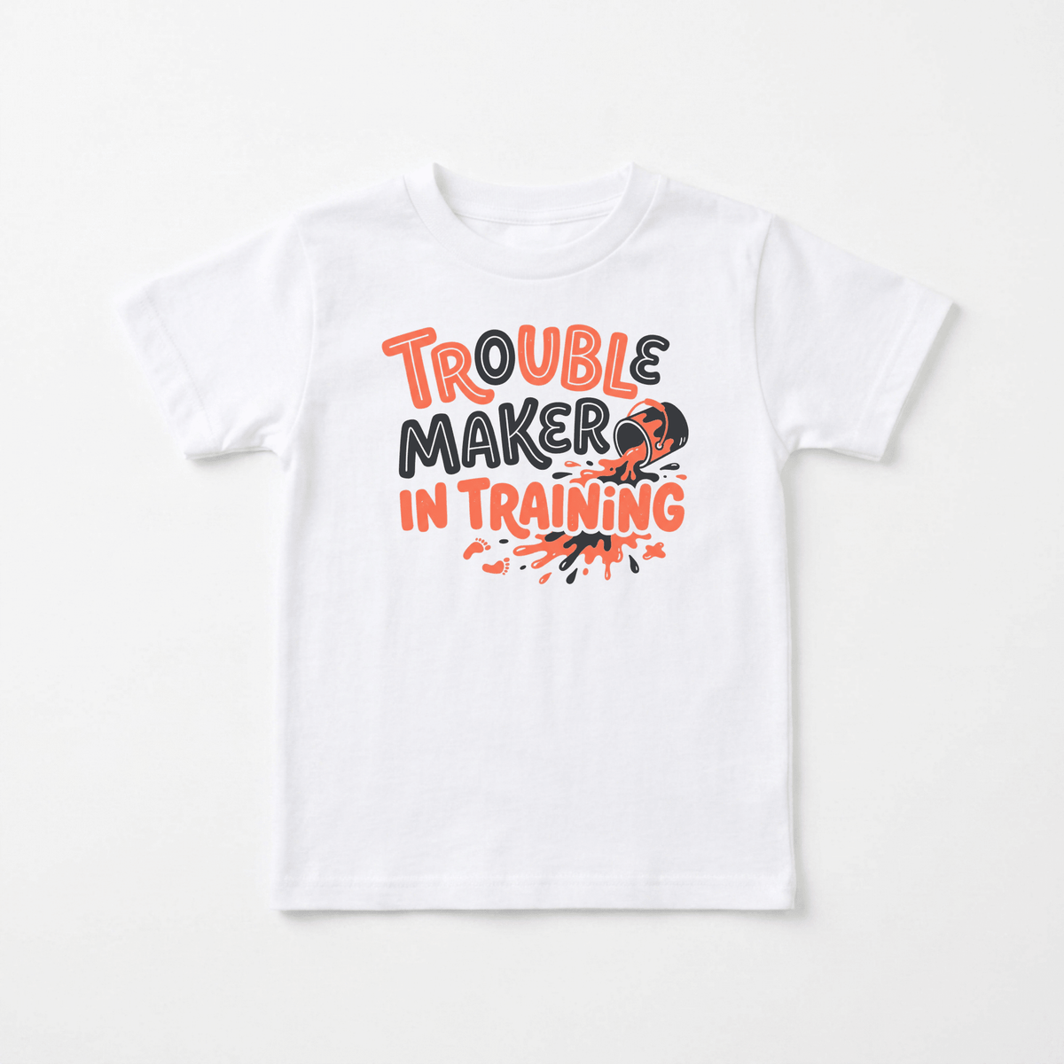 Dress your little one in the Toodleroos Trouble Maker in Training Toddler Shirt—a funny toddler tee featuring bold orange and black text, a playful cartoon splatter, and a cracked egg graphic. This white shirt is the perfect choice for parents looking for a humorous boys’ shirt or an adorable kids’ shirt with personality.
