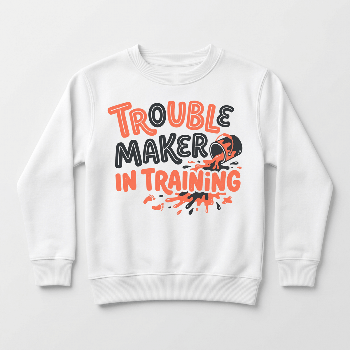 Dress your little one in the Toodleroos Trouble Maker in Training Toddler Sweatshirt – a funny toddler pullover featuring bold orange and black lettering with playful “Trouble Maker in Training” text. An illustrated paint bucket spills vibrant orange paint beneath the letters, adding an extra touch of fun. Made from cozy fleece, this sweatshirt is a comfy and cheerful gift for any toddler.