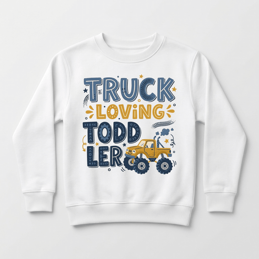 Wrap your little truck fan in comfort with the Toodleroos Truck Loving Toddler Boys Sweatshirt – Monster Truck Pullover. This cozy fleece toddler sweatshirt showcases “Truck Loving Toddler” along with a bold yellow cartoon monster truck, playful blue and yellow stars, tires, and doodles—making it the ultimate monster truck sweatshirt for young enthusiasts.