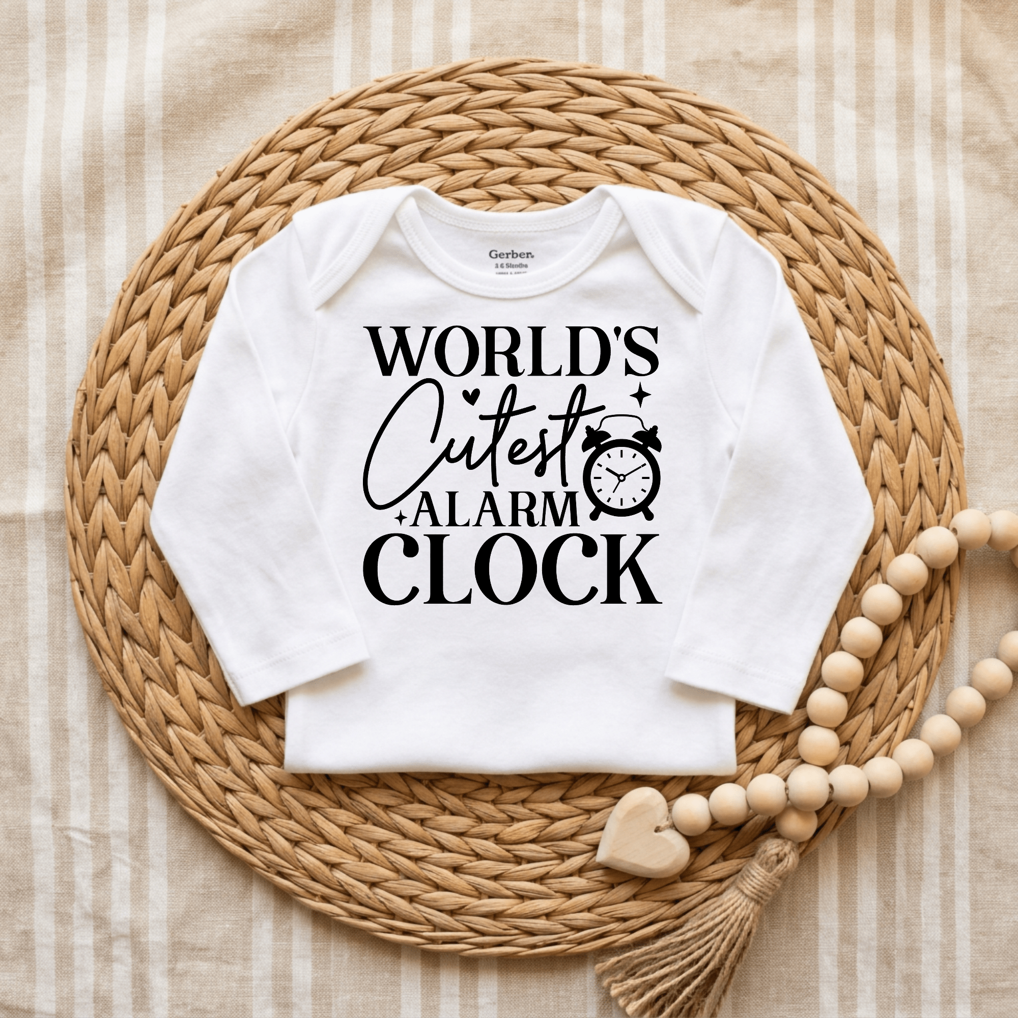 World's Cutest Alarm Clock onesie, a funny gender-neutral design in classic black