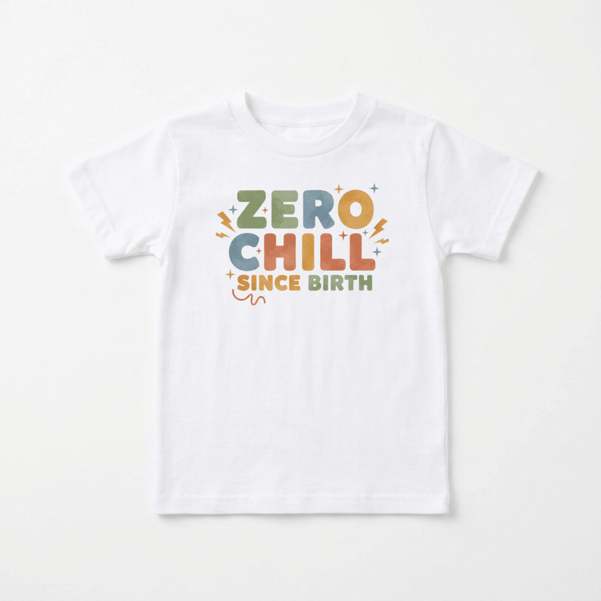 Dress your little one in the Toodleroos Zero Chill Since Birth Toddler Shirt – Funny Retro Tee, featuring a white base with vibrant, retro-inspired lettering that spells out ZERO CHILL SINCE BIRTH. Surrounded by playful stars, lightning bolts, and squiggly line graphics, this witty vintage toddler tee is perfect for energetic kids with a unique sense of humor and style. The ideal zero chill toddler shirt for spirited youngsters who always do things their own way!.
